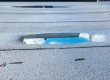How to drain water from a flat roof?